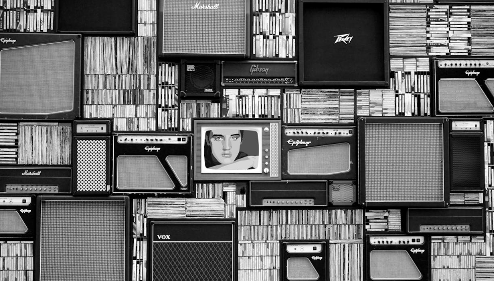 A black and white photo depicting different forms of media and trends