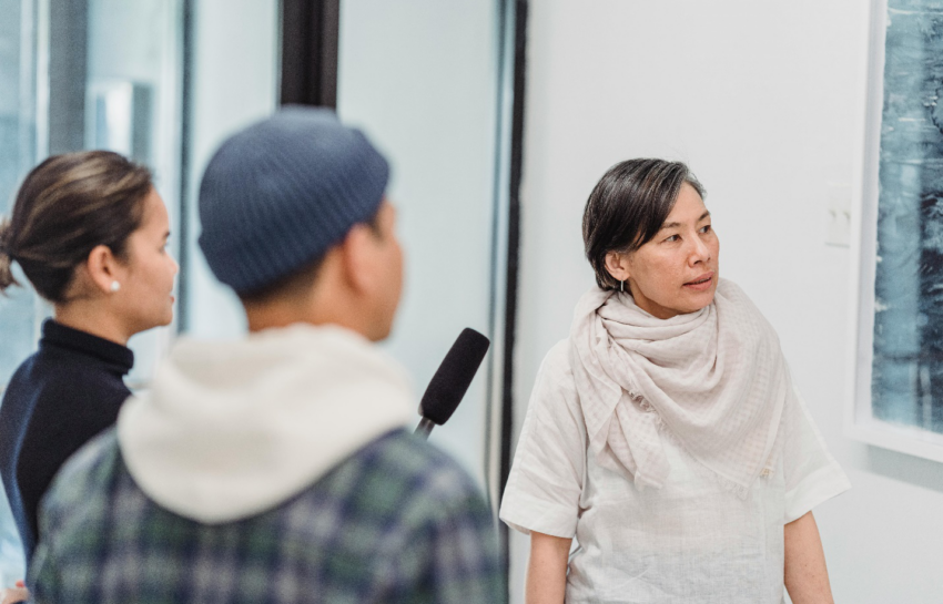 A picture of a person being interviewed