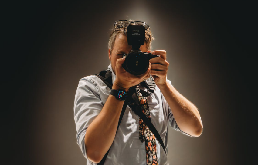 photographer looking through the camera viewfinder