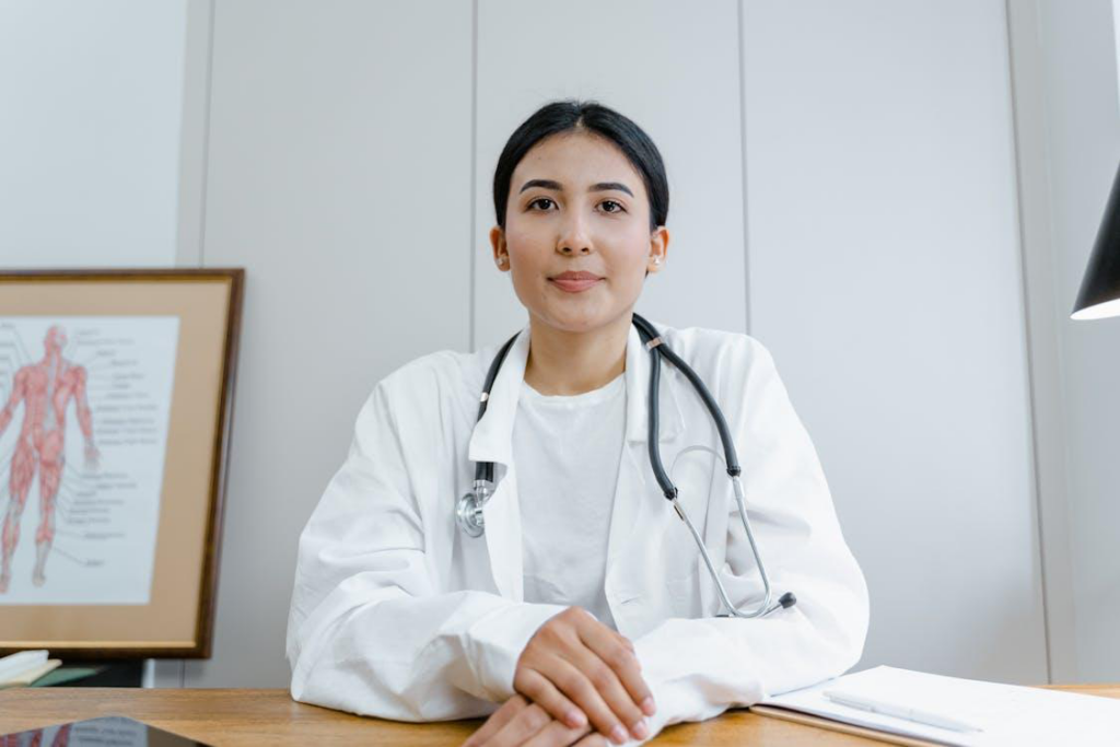 a woman in white scrub suit